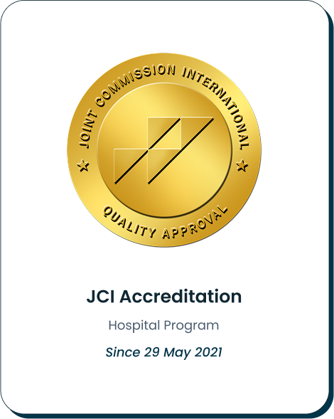 Gold Joint Commission International (JCI) seal labeled 'Quality Approval' with text below stating 'JCI Accreditation – Hospital Program Since 29 May 2021,' symbolizing adherence to international healthcare standards.