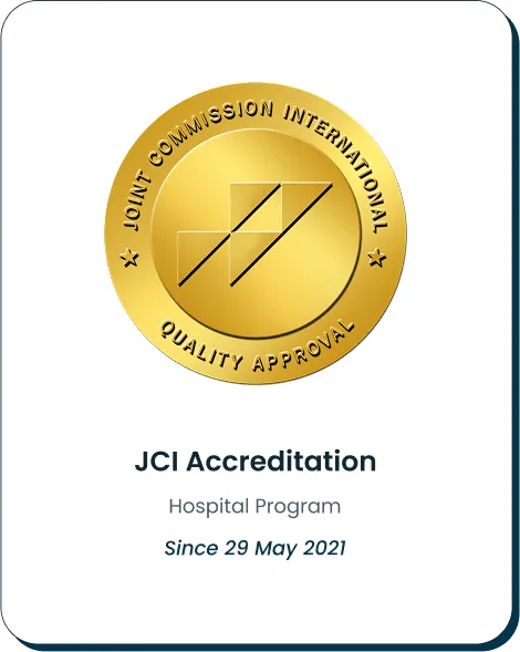 Gold Joint Commission International (JCI) seal labeled 'Quality Approval' with text below stating 'JCI Accreditation – Hospital Program Since 29 May 2021,' symbolizing adherence to international healthcare standards.